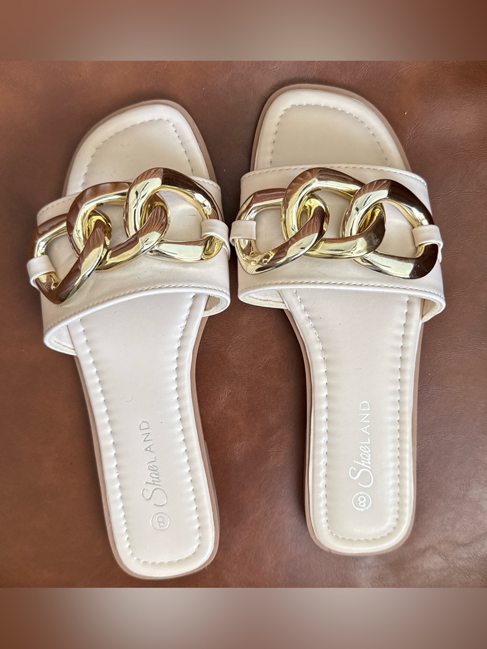 Amazon Cream Slide Sandals with Gold Chain Detail
